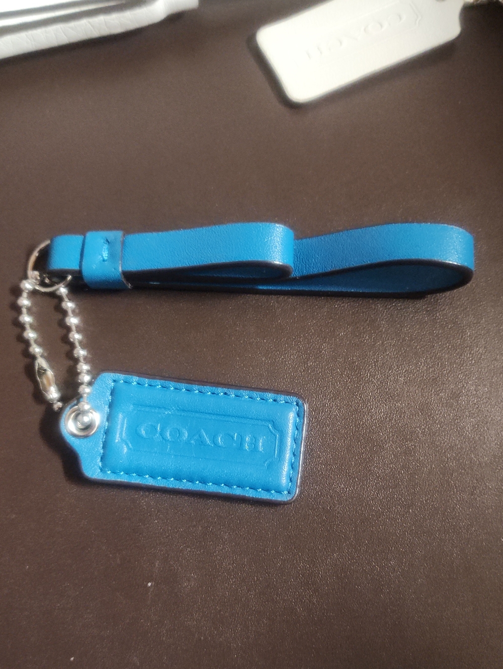Coach Bright Turquoise Leather Hang Tag With Tassel Like New